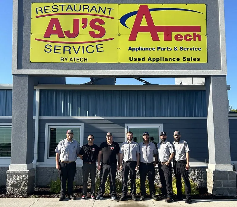 AJ's Restaurant Service team in front of the Springdale location